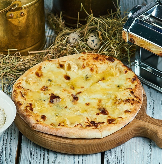 Пицца четыре сыра